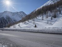Swiss Alps with Clear Sky and Snow-Covered Mountains