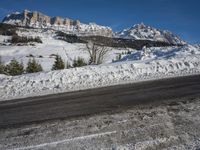 Swiss Alps: A Winding Road through Snowy Landscape