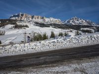 Swiss Alps: A Winding Road through Snowy Landscape
