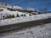 Swiss Alps: A Winding Road through Snowy Landscape
