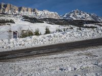 Swiss Alps: A Winding Road through Snowy Landscape