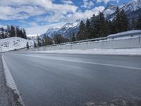 Snowy Mountain Road in Switzerland's Alps