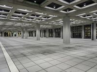 Symmetrical Interior Design in a Hall with Glass Ceiling