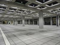 Symmetrical Interior Design in a Hall with Glass Ceiling