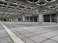 Symmetrical Interior Design in a Hall with Glass Ceiling