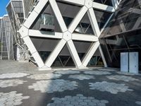 the building is shaped like hexagons with geometric designs on them as if they were carved into stone