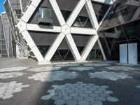 the building is shaped like hexagons with geometric designs on them as if they were carved into stone