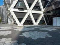 the building is shaped like hexagons with geometric designs on them as if they were carved into stone