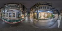 a distorted image of a city street by a tall building at night with an umbrella