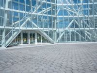 the inside of an office building has windows and a light inside it on the outside