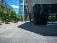 two tall buildings are in the background in this view of another building in the foreground