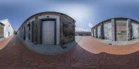 several concrete doors are opened and the sky is blue and clear in color - this photo shows an individual's perspective to the whole view