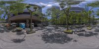 the view of people walking around in a circular plaza at daytime, with trees and plants