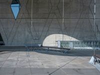 there is no image to describe, but this one shows it's a concrete building with square windows