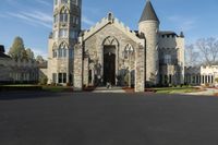 this is a church with a steeple, and a tower with a cross on the front