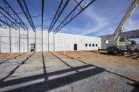 there are a lot of construction tools inside of this building together on a sunny day