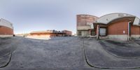 three panoramic images of an industrial building from a circular view of the street