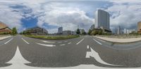 several arrows point at each other on an empty street in front of the city skyline