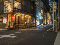 Tokyo City Life at Night: Street Lights Illuminating the Urban Landscape