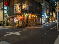 Tokyo City Life at Night: Street Lights Illuminating the Urban Landscape