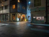 this is a shot of a restaurant at night with no one in it as if it is coming to the door