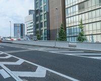 the two way street is wide open for traffic at an angle on an empty road