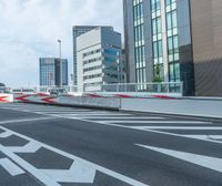 Tokyo, Japan: Modern Asphalt Road Lined with Armco Barriers