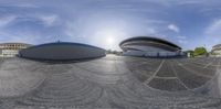 a spherical photo of the olympic stadium on a nice day for tourists to visit -