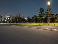 city street with a wide assortment of buildings in the background and cars moving through it