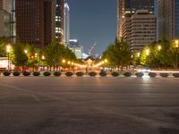 city street with a wide assortment of buildings in the background and cars moving through it