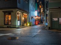 this is a shot of a restaurant at night with no one in it as if it is coming to the door