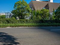 the city of richmond has long white arrows running down it's side and a pedestrian crossing over an expressway