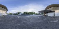 a fisheye lens panoramic view of a large, public space with several domed spaces