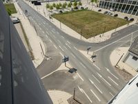 an intersection on a city street with no cars or cars going through it in this photo