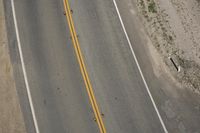 Top Down View of Asphalt Road on a Sunny Day