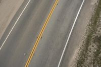 Top Down View of Asphalt Road on a Sunny Day