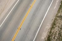 Top Down View of Asphalt Road on a Sunny Day