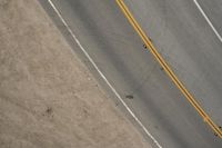 Top Down View of Asphalt Road on a Sunny Day