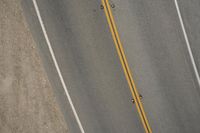 Top Down View of Asphalt Road on a Sunny Day