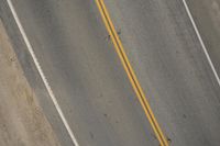 Top Down View of Asphalt Road on a Sunny Day