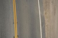 Top Down View of Asphalt Road on a Sunny Day