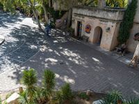 an aerial picture of a small courtyard in a village in the mediterranean region of turkey