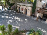 an aerial picture of a small courtyard in a village in the mediterranean region of turkey