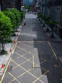 this is an image of there is a empty street in china that is empty of vehicles and no cars on it