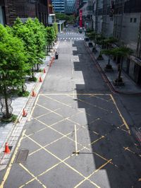 this is an image of there is a empty street in china that is empty of vehicles and no cars on it