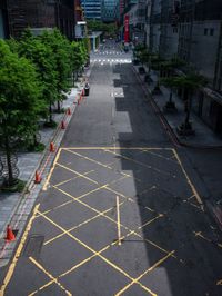 this is an image of there is a empty street in china that is empty of vehicles and no cars on it