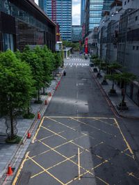 this is an image of there is a empty street in china that is empty of vehicles and no cars on it