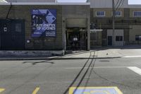 a yellow and white street sign sitting on the side of a building, with a blue poster for the marathon on it,