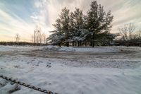 this is a picture of the landscape near my house in the wintertime, looking at the ground and a sidewalk