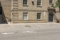 a man on a skateboard outside an old building with cars parked on it's side